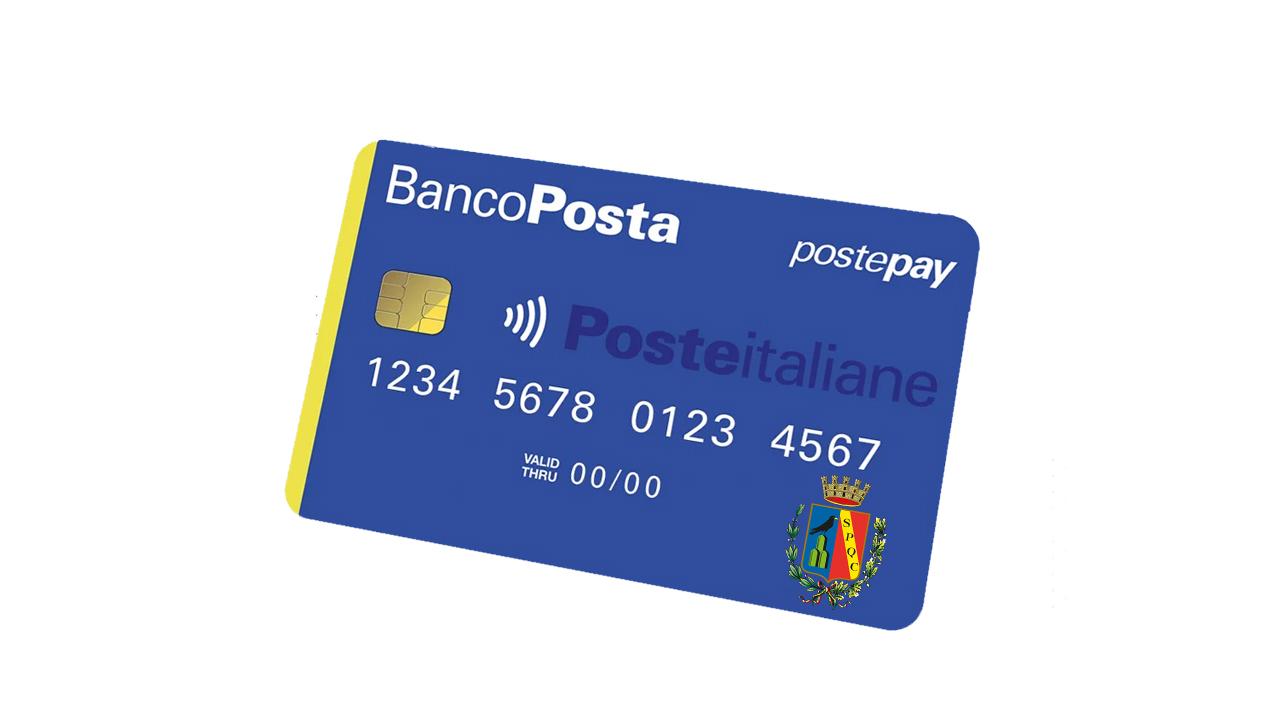 Carta Postepay su sfondo neutro, utilizzata per il contributo economico "Carta dedicata a te 2025", un sostegno per l'acquisto di alimenti e beni essenziali per le famiglie in difficoltà.
